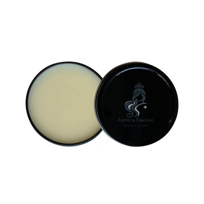 Black container with a lid, containing a white cream or paste, on a white background.