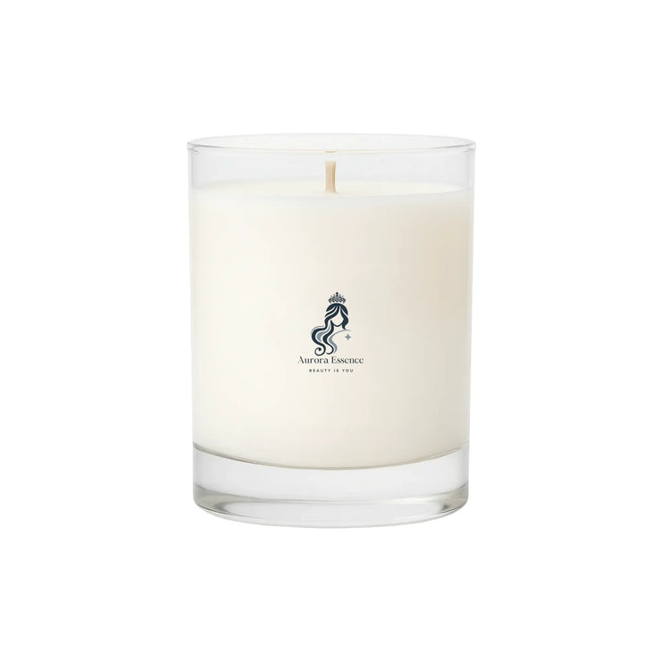 White candle in a glass container with a logo on a white background