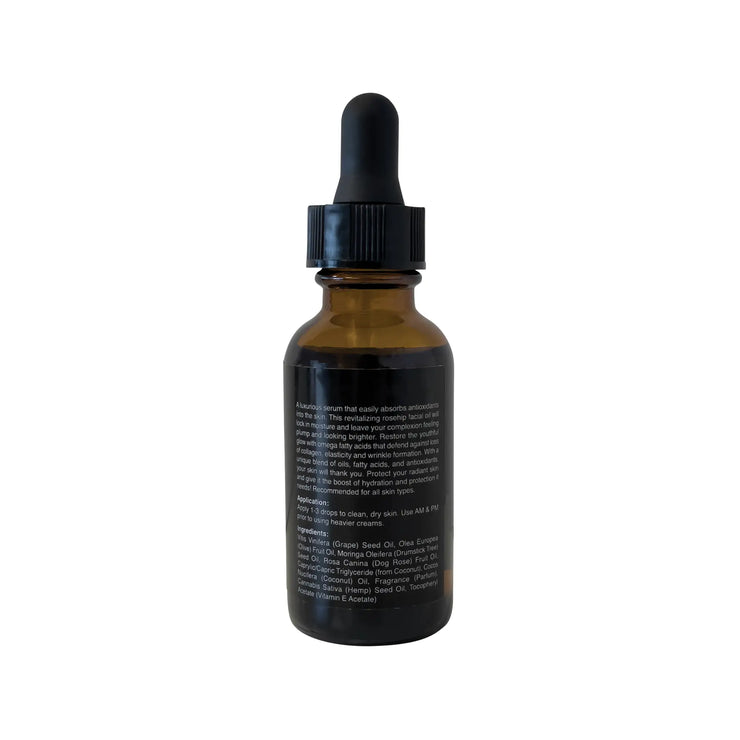 Amber glass dropper bottle with black cap on a white background