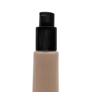 Foundation bottle of BB Cream with black cap on a white background