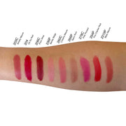 Lipstick swatches on a arm with color names listed